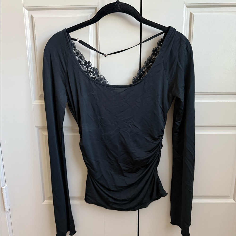 Free People “Intimately” long sleeve blouse. Never worn!